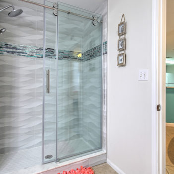 Shower with glass enclosure