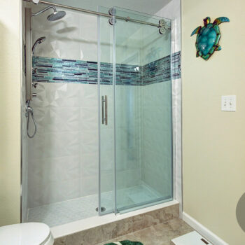 Shower with glass enclosure