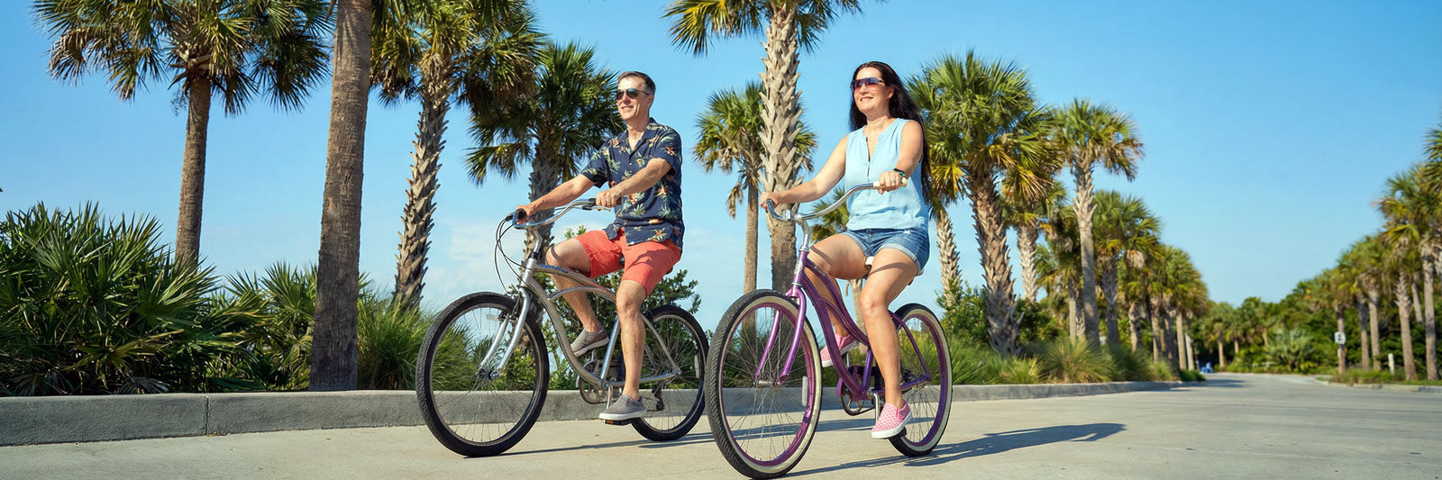 Couple riding rental bikes near Clearwater Beach