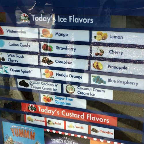 The menu options, including the Italian ice flavors and custards.